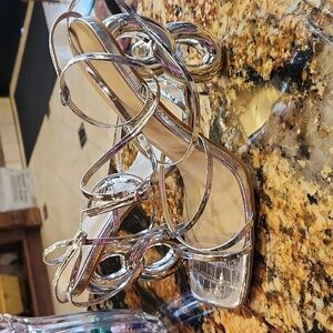Silver 8 shaped heeled sandals..wrap around ankle